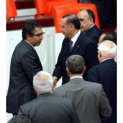ERDOĞAN DAN MUMCU YA KUTLAMA
